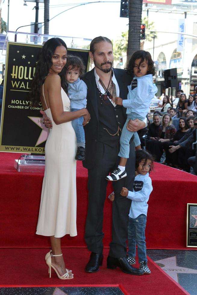 LOS ANGELES  MAY 3 - Zoe Saldana, Marco Perego, sons at the Zoe Saldana Star Ceremony on the Hollywood Walk of Fame on May 3, 2018 in Los Angeles, CA photo