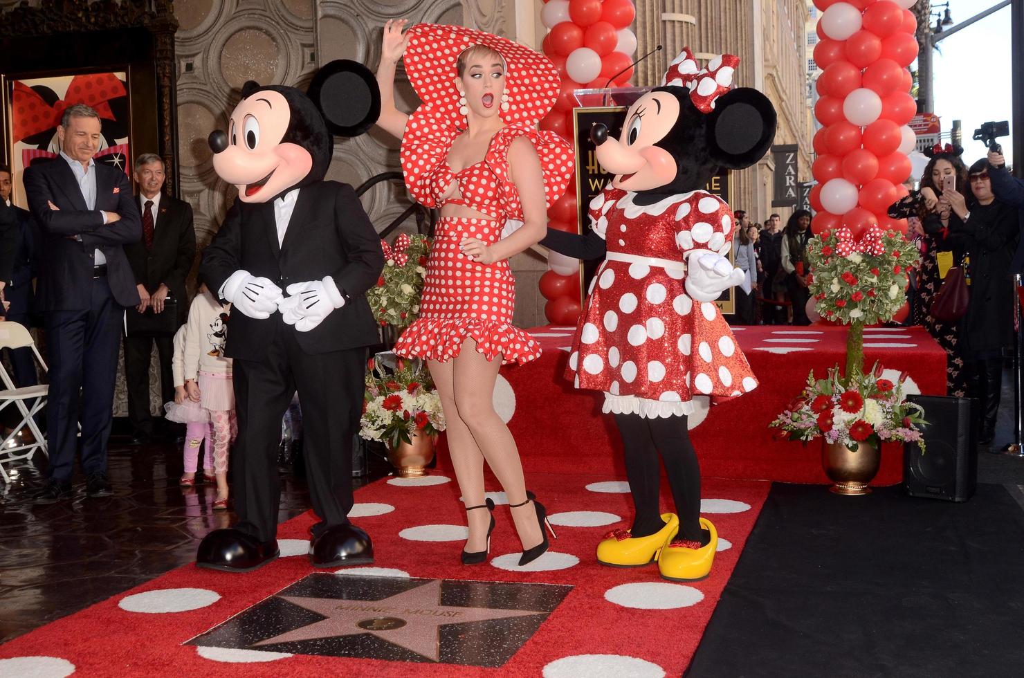 LOS ANGELES   JAN 22 - Mickey Mouse, Katy Perry, Minnie Mouse at the Minnie Mouse Star Ceremony on the Hollywood Walk of Fame on January 22, 2018 in Hollywood, CA photo