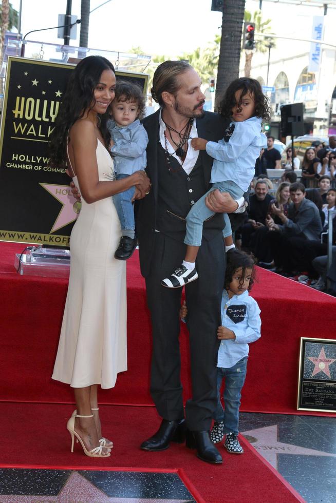 LOS ANGELES  MAY 3 - Zoe Saldana, Marco Perego, sons at the Zoe Saldana Star Ceremony on the Hollywood Walk of Fame on May 3, 2018 in Los Angeles, CA photo