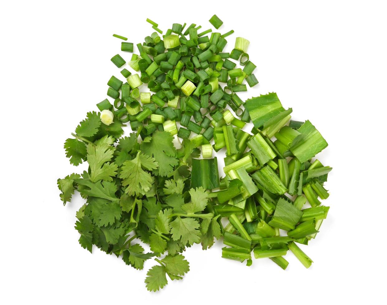 Spring chopped onions leaves, chopped parsley leaves, chopped culantro leaves Isolate on a white background, top view. photo