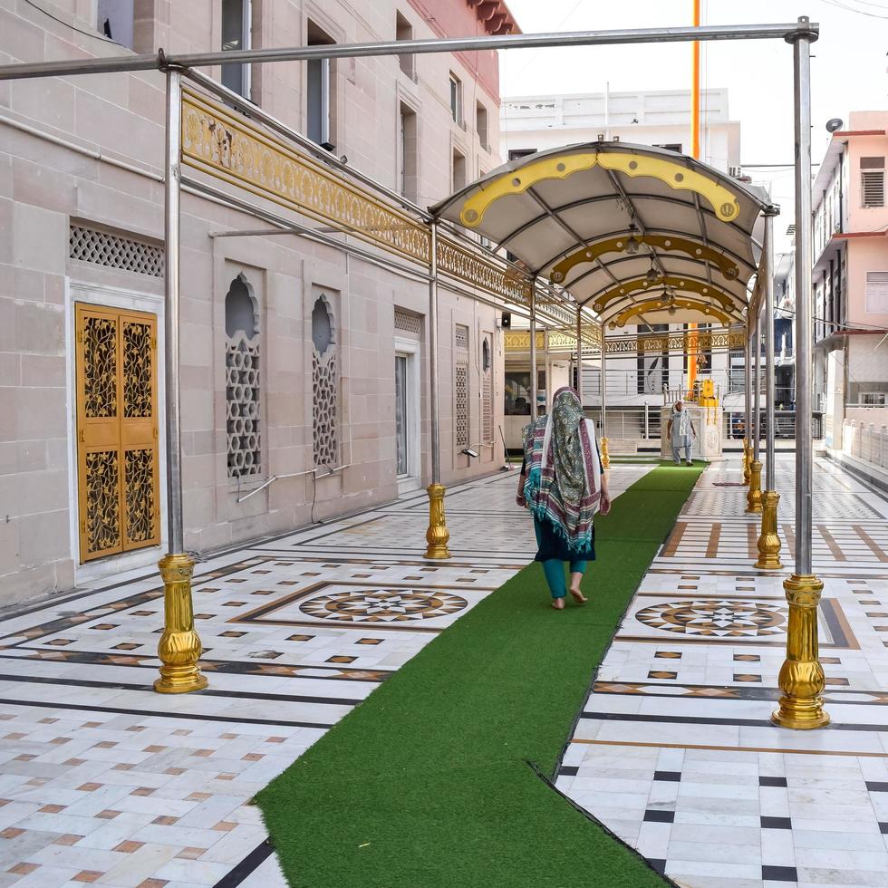 Gurudwara Sis Ganj Sahib is one of the nine historical Gurdwaras in Old Delhi in India, Sheesh Ganj Gurudwara in Chandni Chowk, opposite Red Fort in Old Delhi India photo