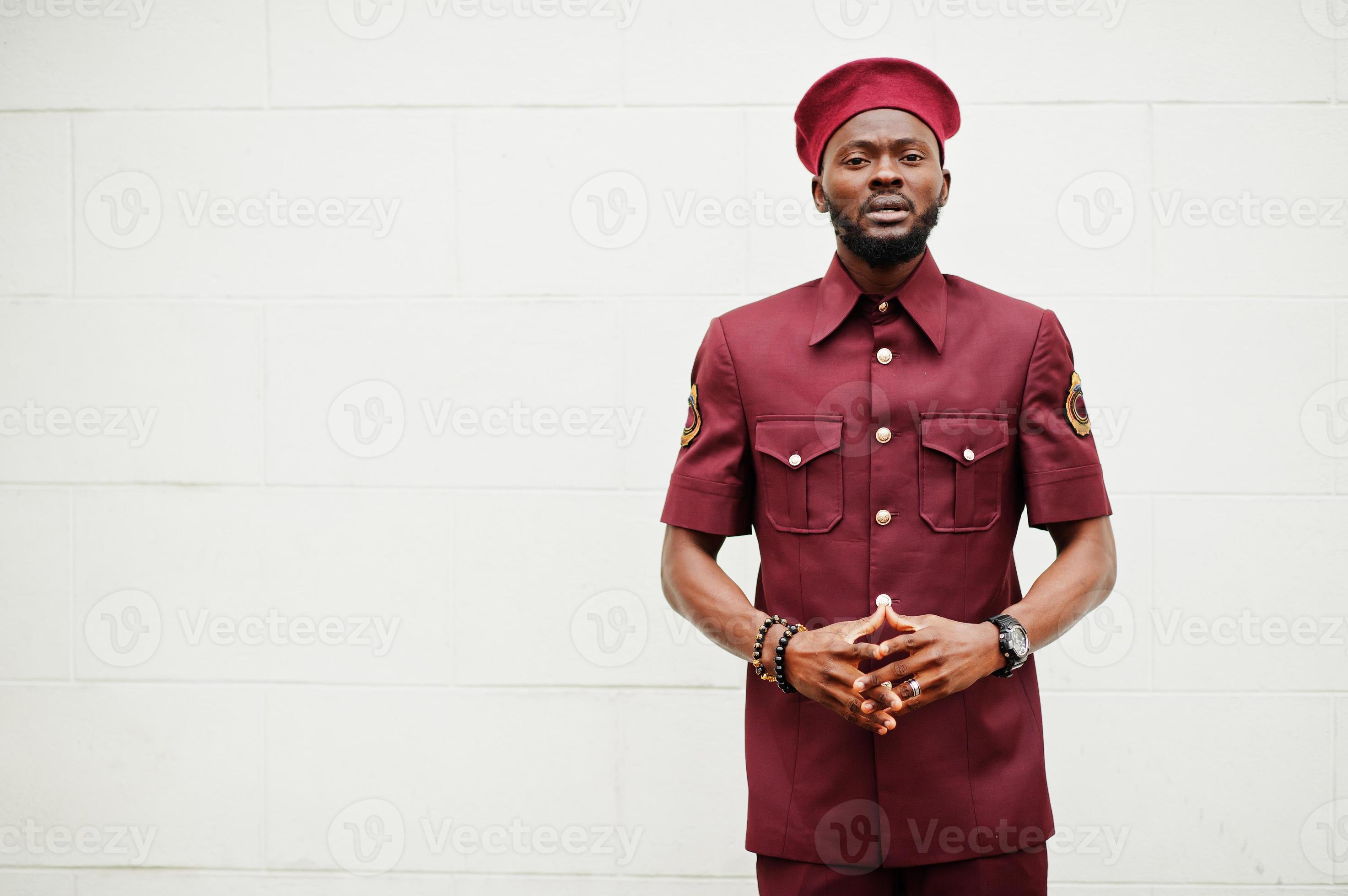 Portrait of African American military man in red uniform and beret