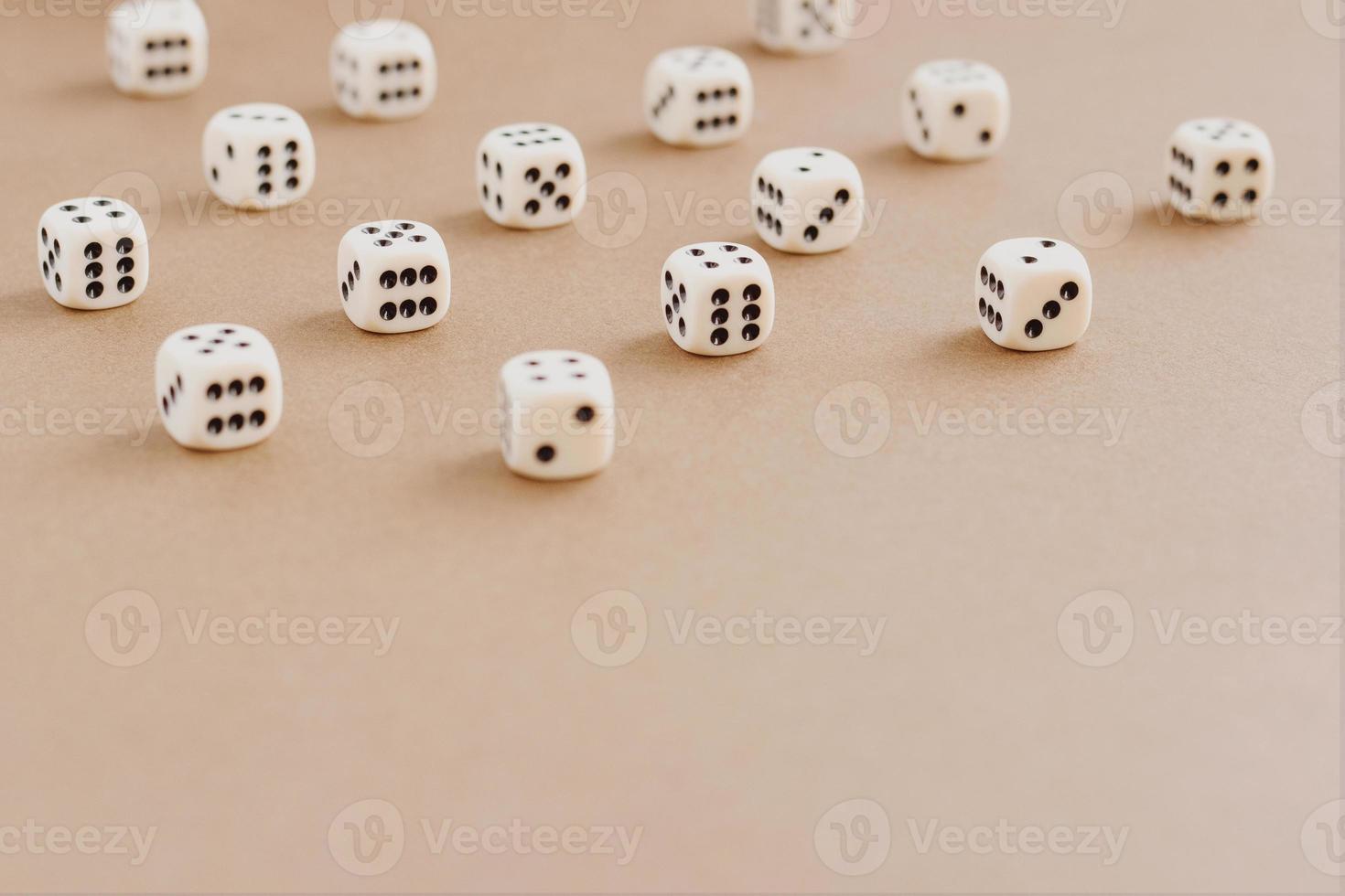 Set of gaming dice with copy space on brown background. Concept for games, game board, role playing game, risk, chance, good luck or gambling. Toned image top view. Close-up photo