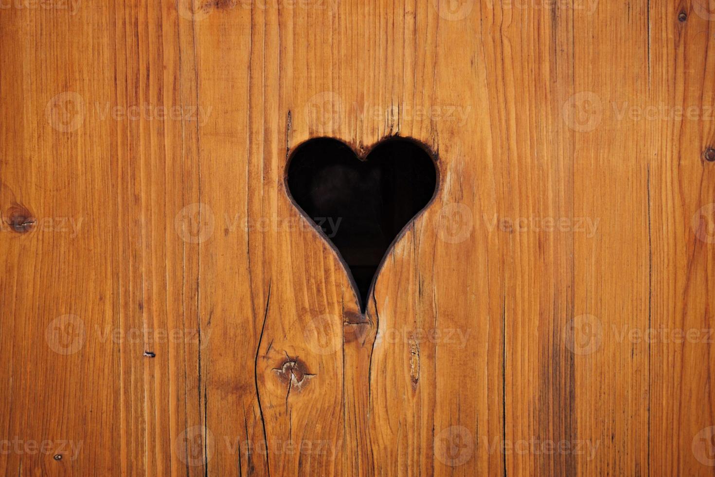 Heart shape in wood photo