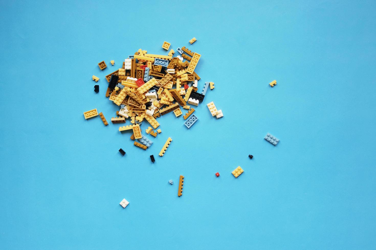 BANGKOK, THAILAND - june 13, 2022  Group of lego toys on blue background. photo