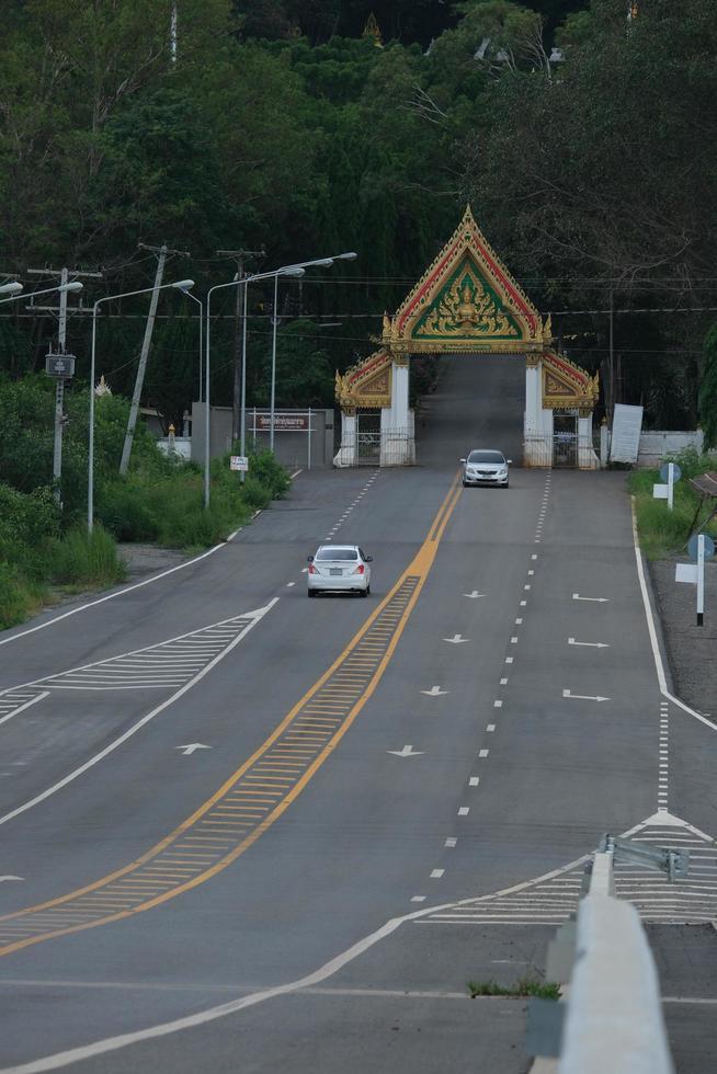 The car was running on the road near the mountains. Nakhon Ratchasima, Thailand, 16-05-2022 photo