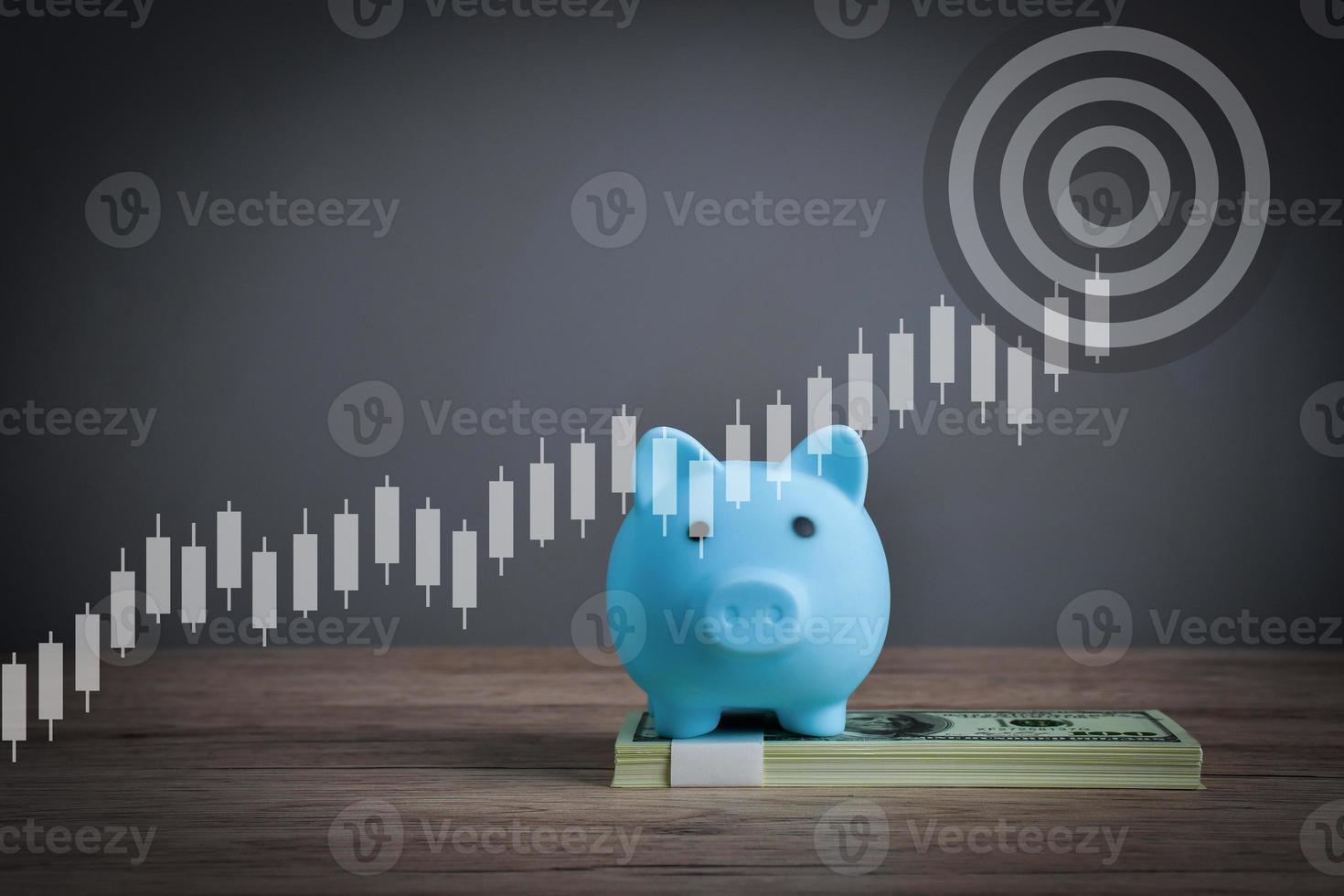 Saving a blue pig on a dollar bill to show wealth through saving money. photo