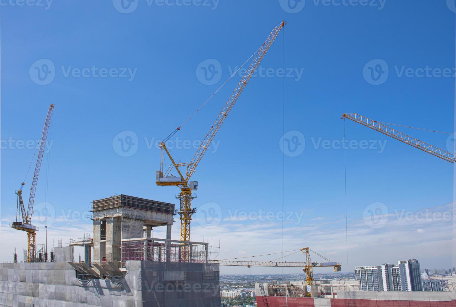 The Crane tower in construction  site of a high-rise condominium. photo
