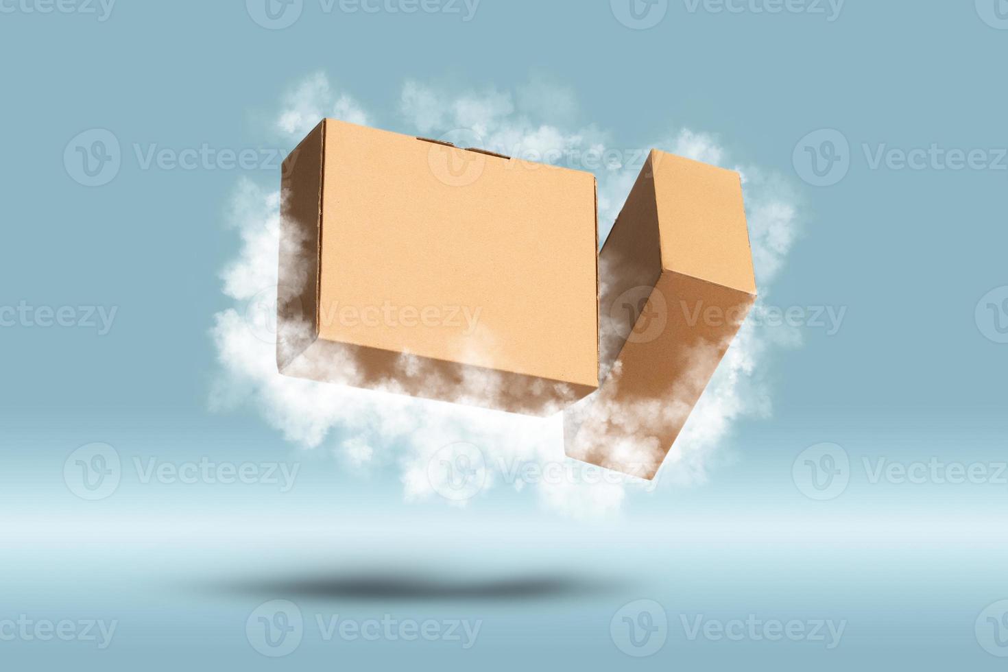 Brown Carton Cardboard box flying with clouds on grey background photo