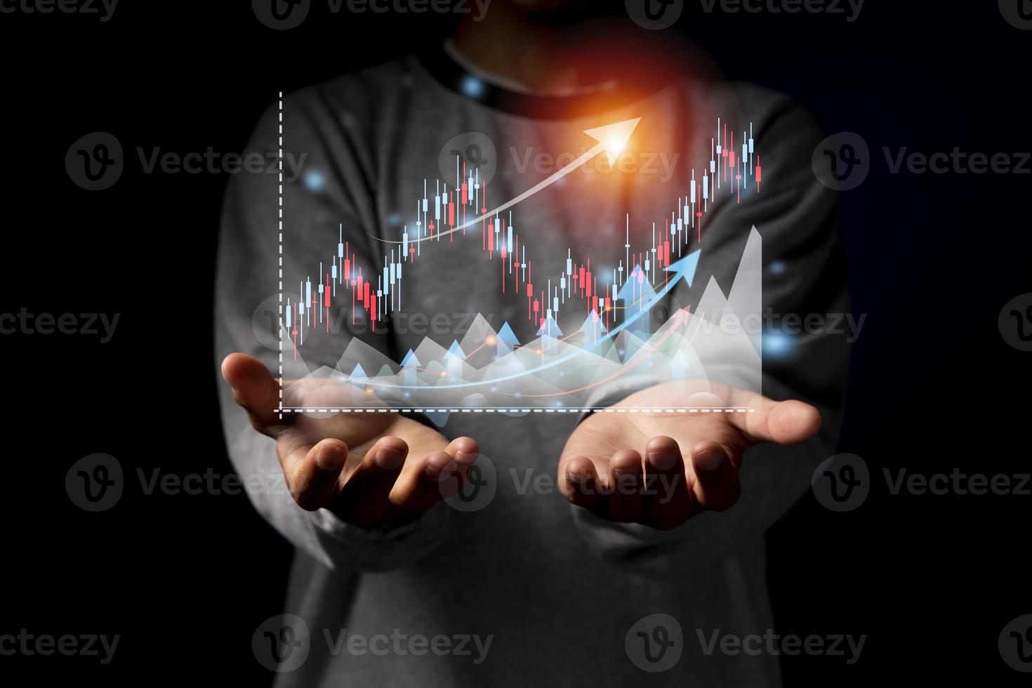 Hand of Businessman or trader is showing a growing virtual hologram stock photo