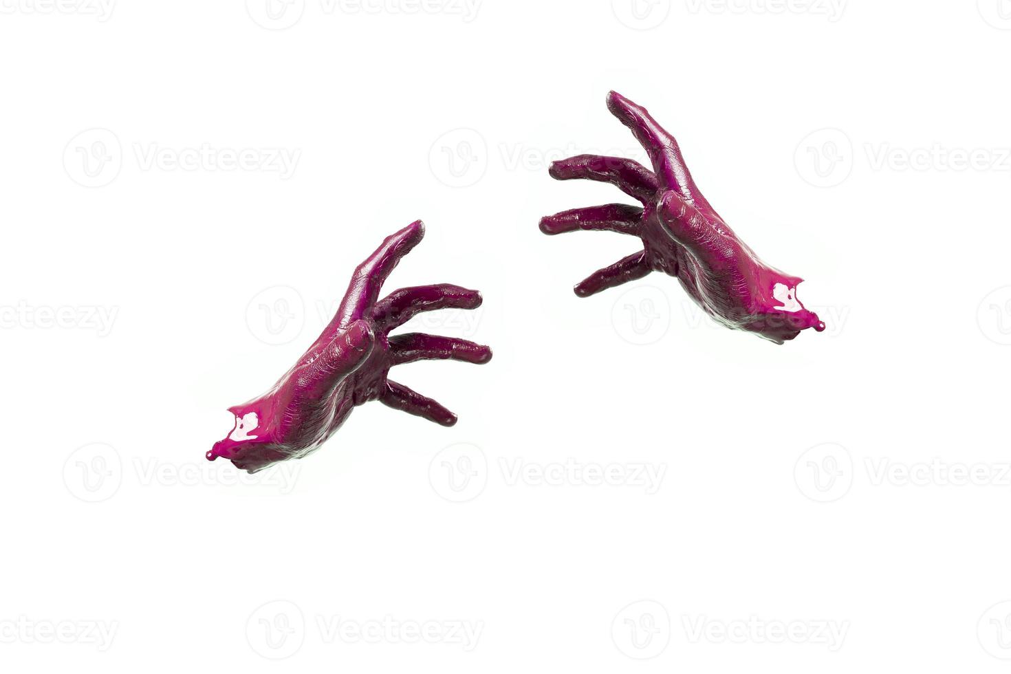 Elegant female hand on a red paint isolated on a white background photo