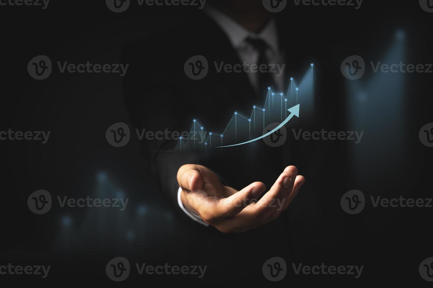 Businessman analyze sales data and graph economic growth. Planning and business strategy Analysis of forex trading Finance and banking. photo