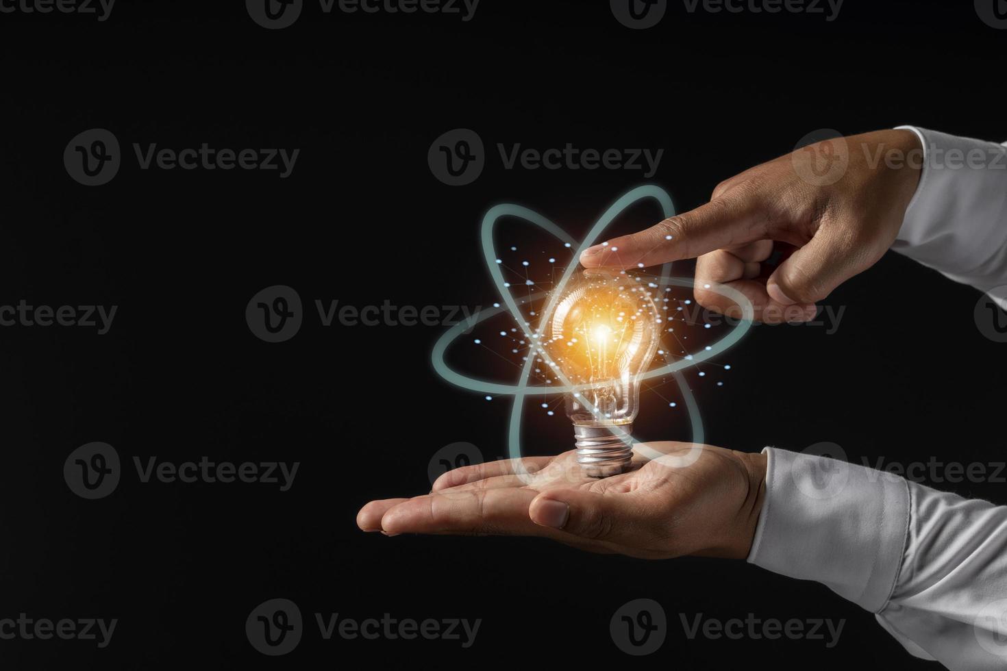 Man holding light bulbs, ideas of new ideas with innovative technology and creativity. photo