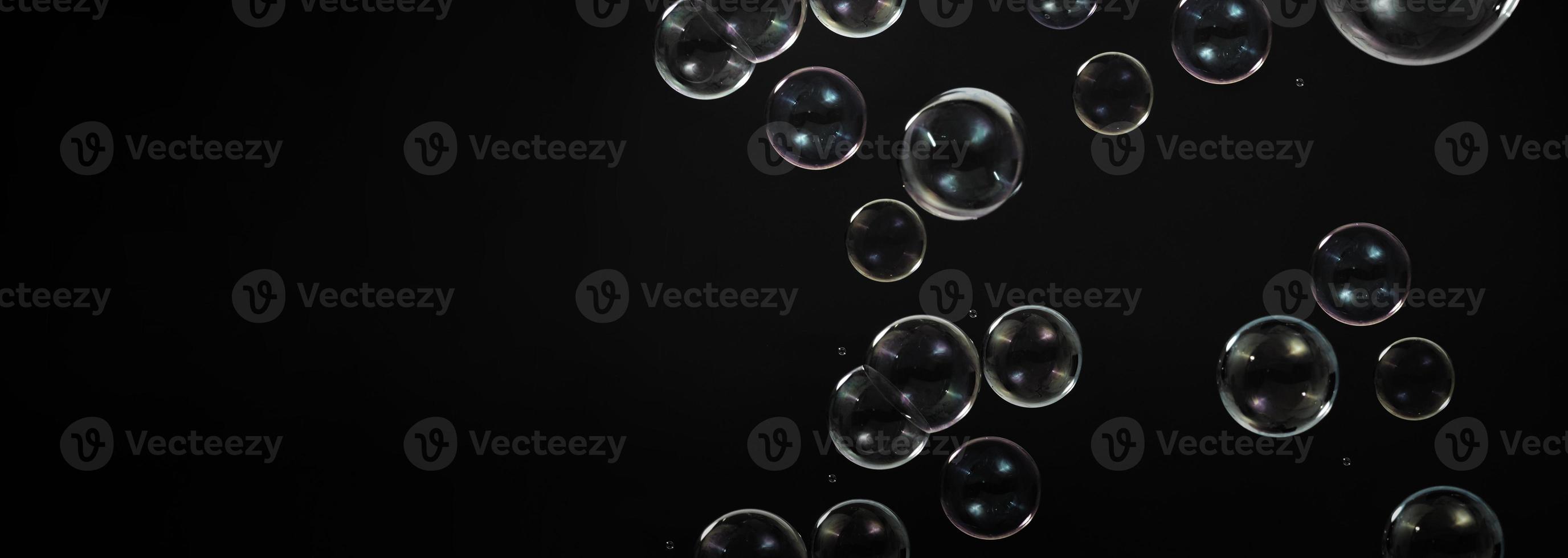 Soap bubble drop or Shampoo bubbles floating like flying in the air photo