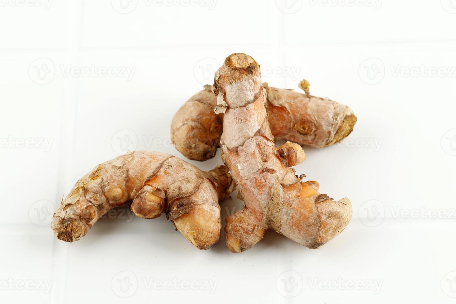 Turmeric Curcuma Longa Linn Rhizome Root Isolated on White Background. photo