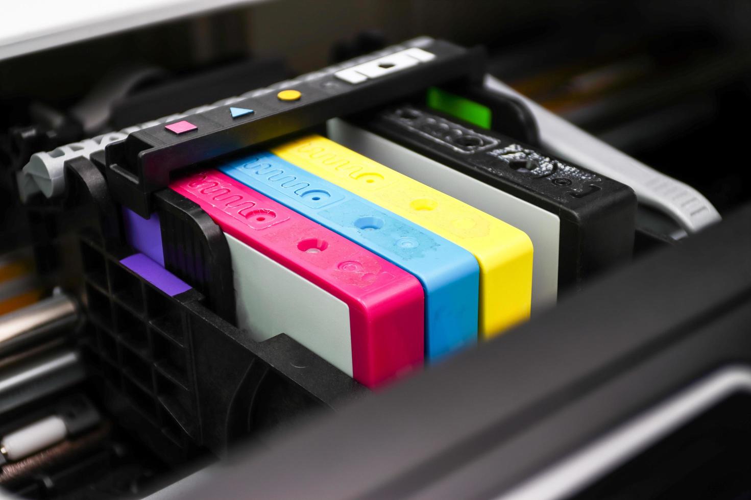 An ink cartridge or inkjet cartridge is a component of an inkjet printer that contains the ink four color photo