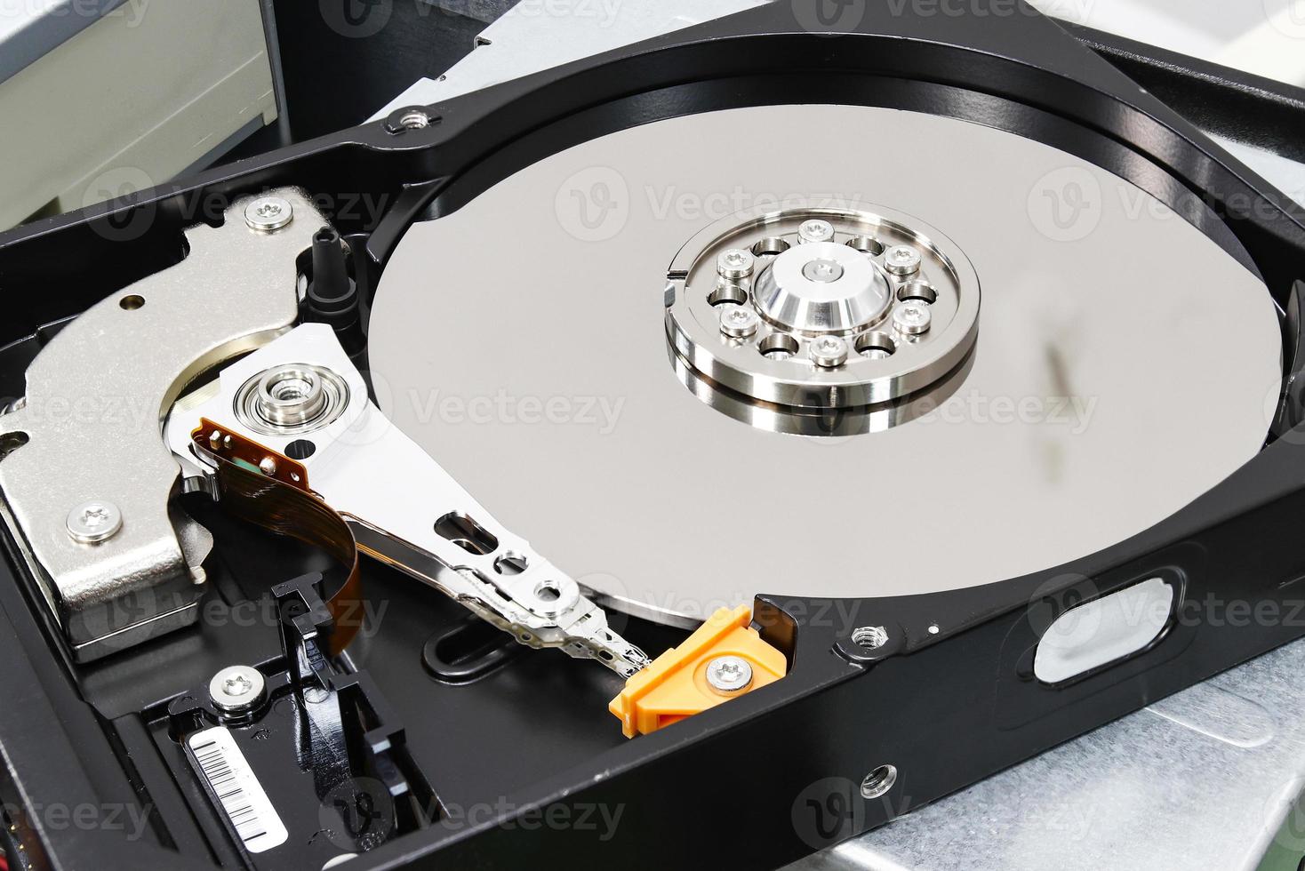 Hard disk drive for computer concept Working data storage read write photo