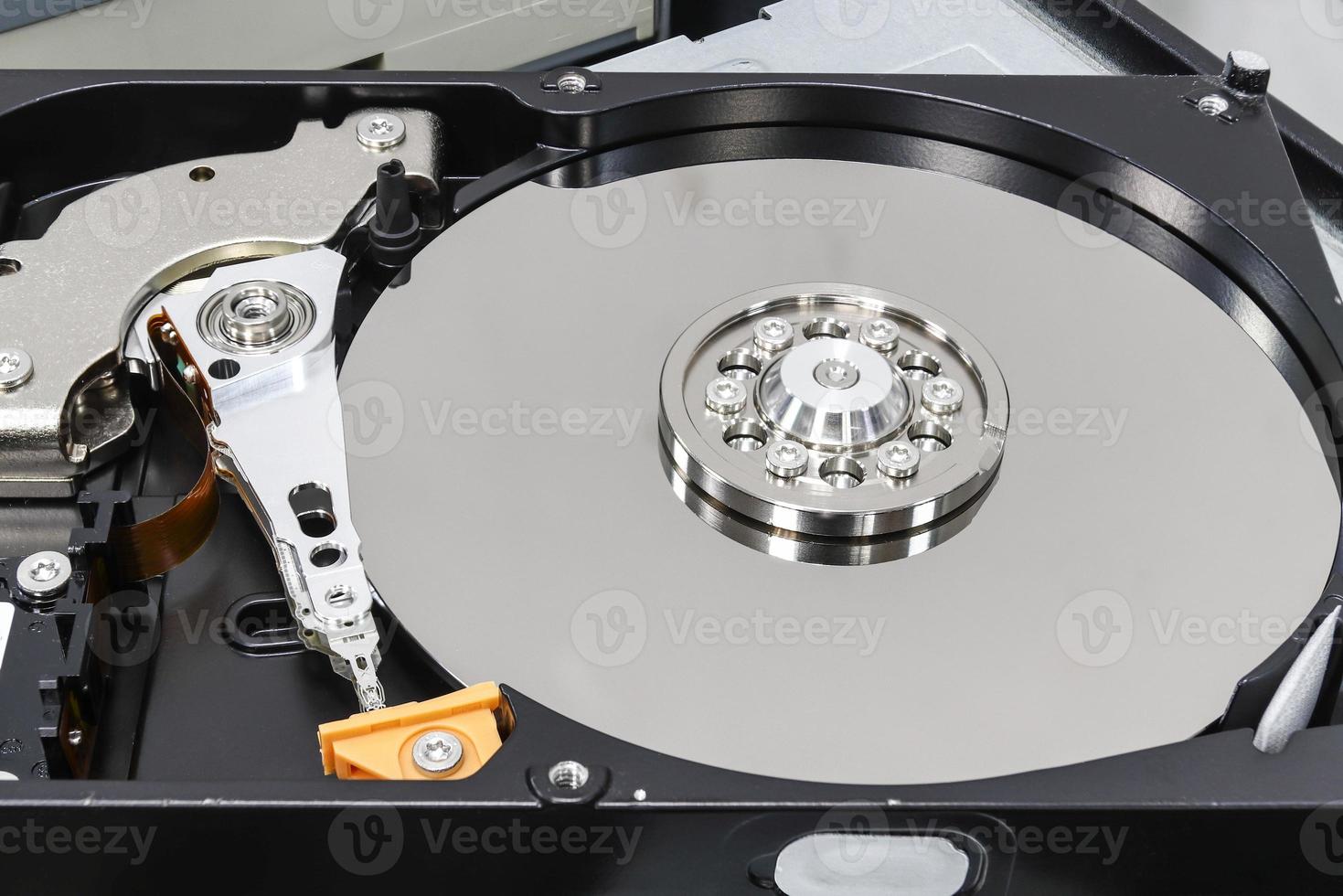 Hard disk drive for computer concept Working data storage read write photo