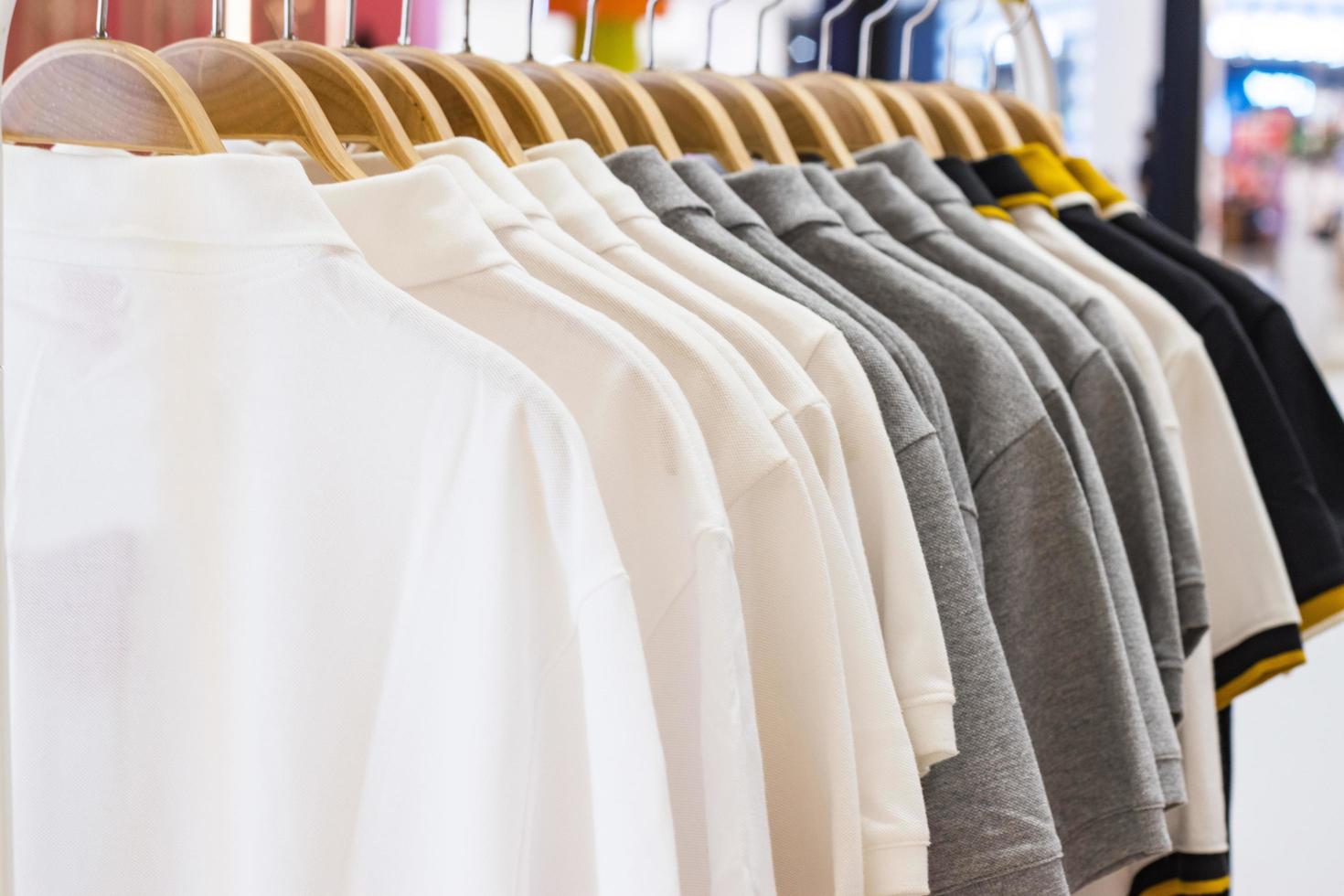 Cotton t-shirt hanging on a hanger men for sales photo