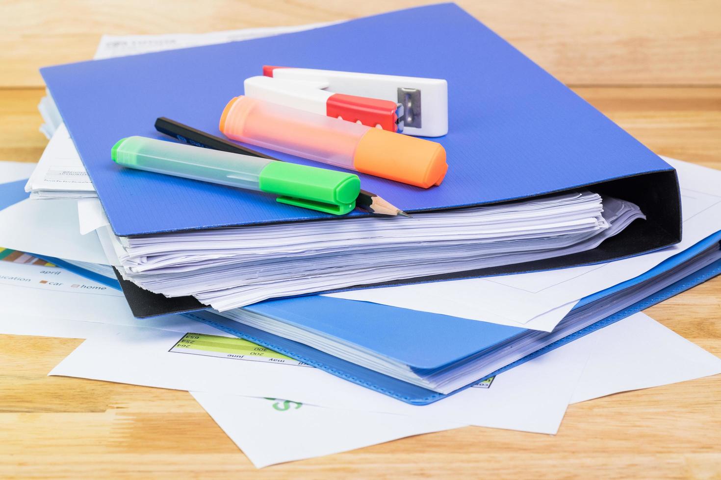 pencil, paper sheeet, folder file,graph sheet, Color highlight pen concept Office equipment photo