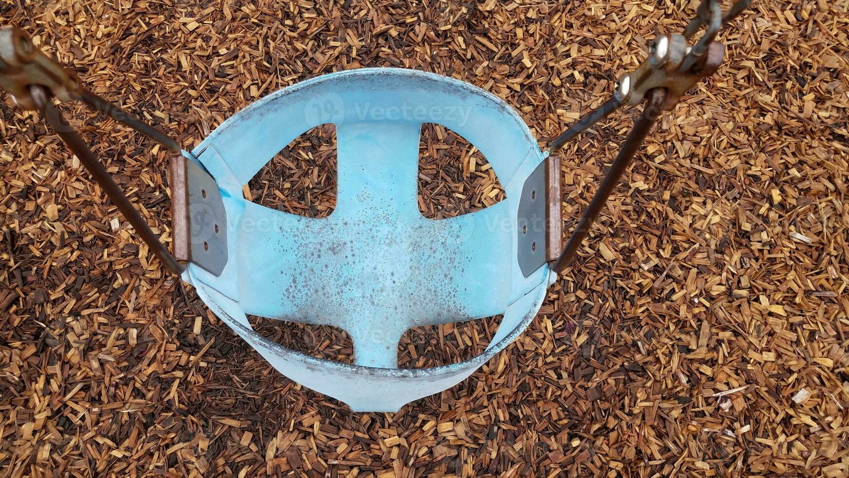 blue baby or toddler swing seat with mildew photo