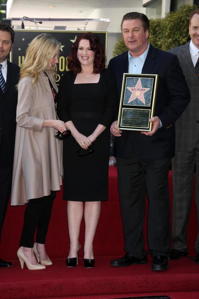 LOS ANGELES  FEB 14 - Anne Heche, Megan Mullally, Alec Baldwin at the Walk of Fame Star Ceremony for Alec Baldwin at Beso Resturant on February 14, 2011 in Los Angeles, CA photo