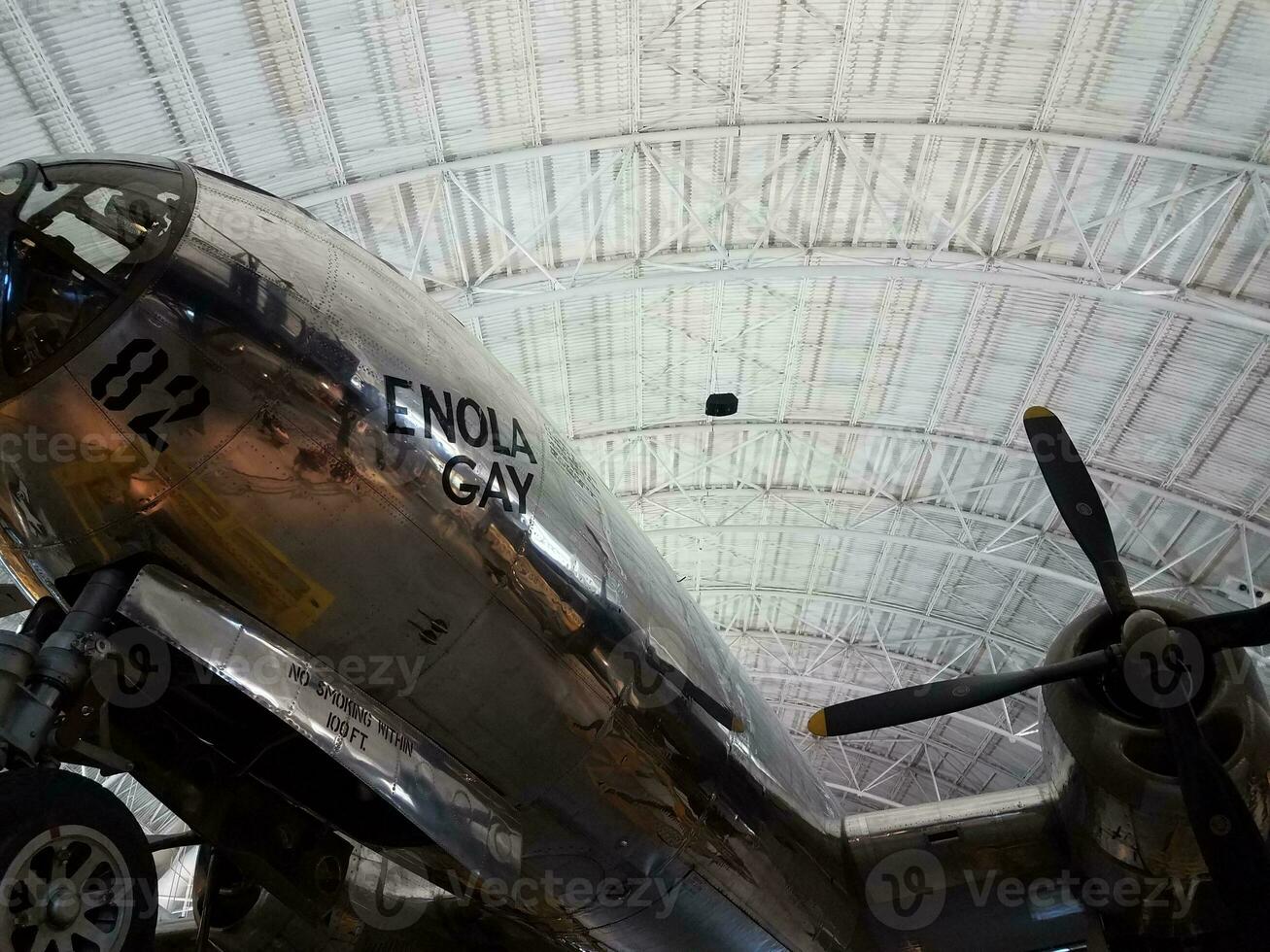 the enola gay airplane in a hangar photo