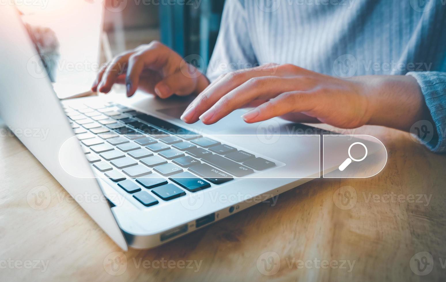 SEO Search engine optimization, Search technology, women's hands using a computer keyboard to search for information, using websites search bar to find the desired information or shopping online. photo