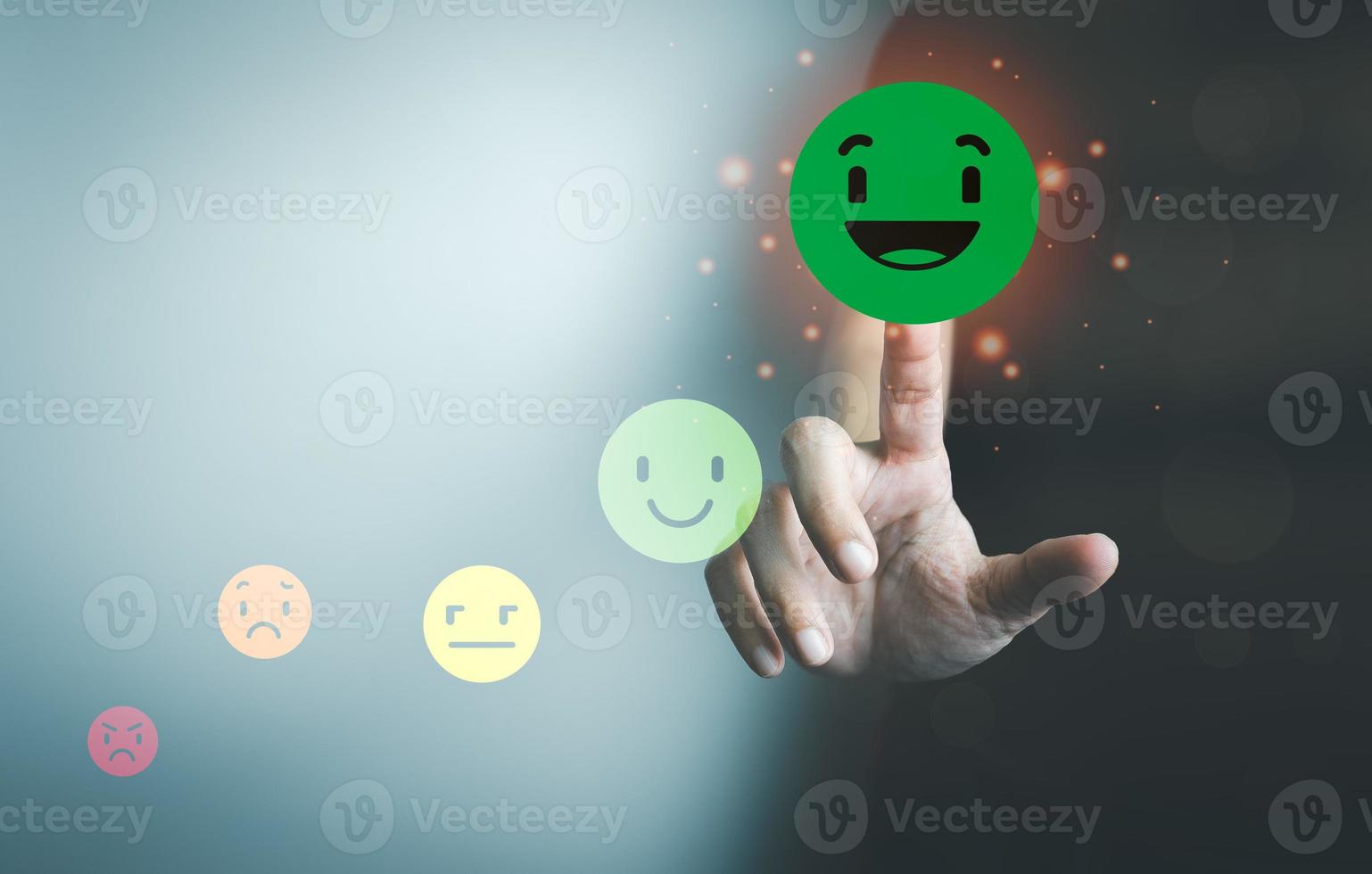 Customer satisfaction concept, client is satisfied with pressing the smile face icon, excellent service, impressed with care, highest rating and score, good feedback from users. photo