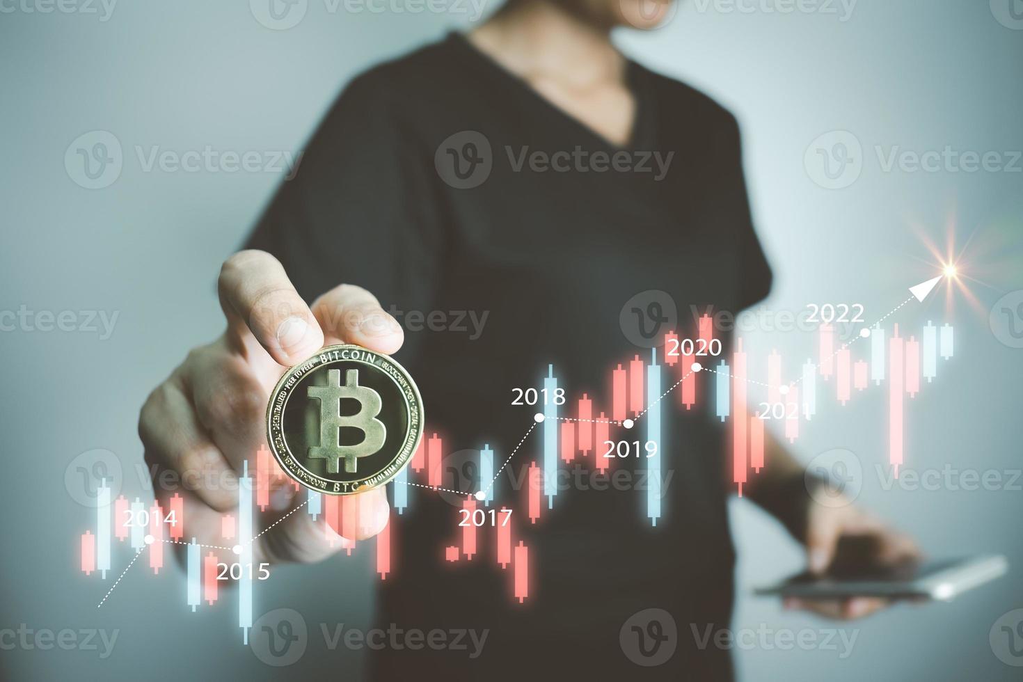 Cryptocurrency Investor holding bitcoin, analyzing graph with smartphone, businessman forecast growth of Blockchain technology, future of financial, Decentralized financi DeFi, Global Economy. photo