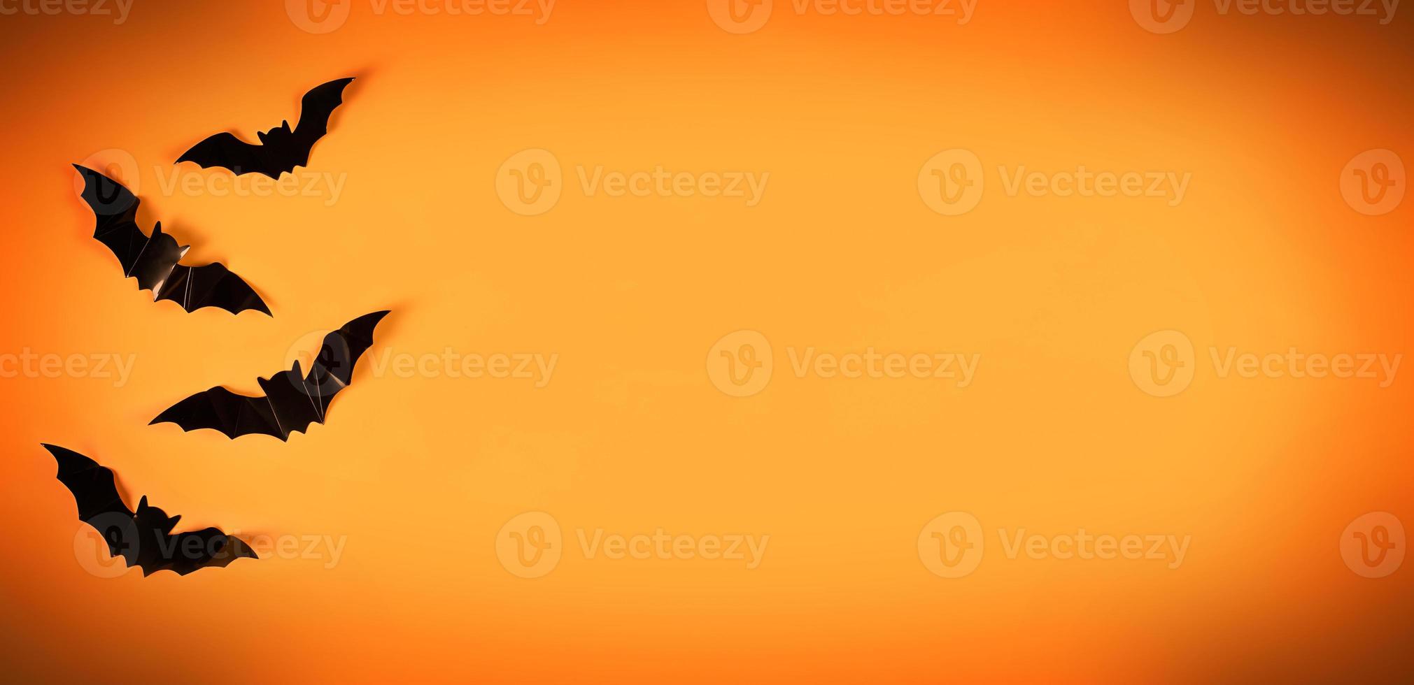 Happy halloween on orange background. Special offer symbol. Celebration concept. Discount offer price sign photo