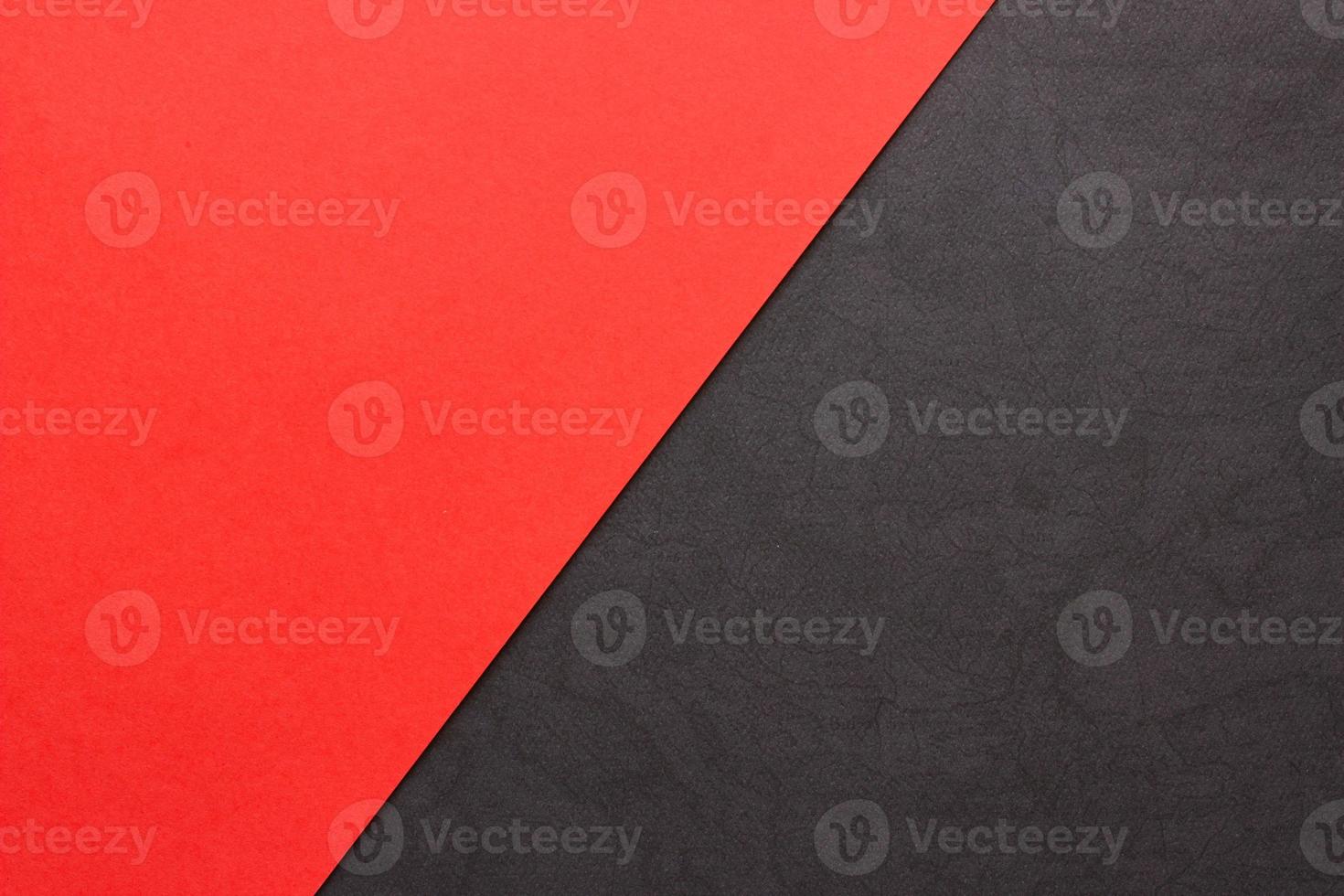 Red and textured black paper background. Abstract banner, poster with place for text. Minimalism photo