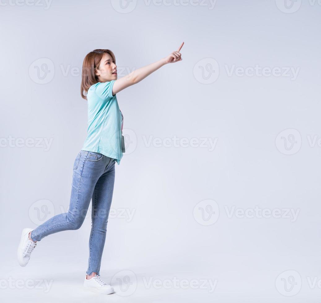 Portrait of young Asian businesswoman on white background photo