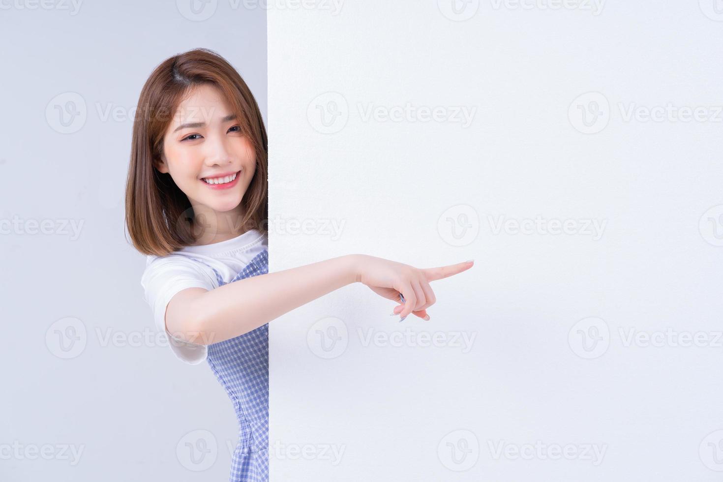 Image of young Asian girl on white background photo