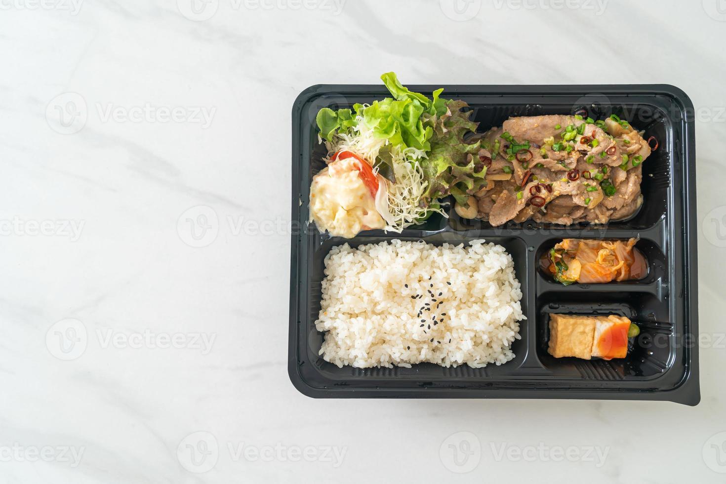 Japanese rice with pork yaki bento set photo