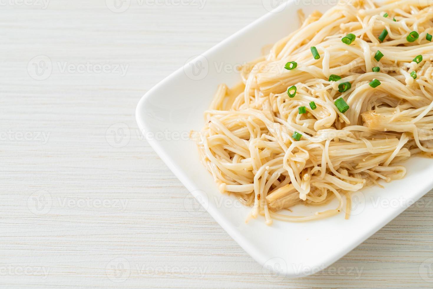 stir-fried golden needle mushroom with butter photo