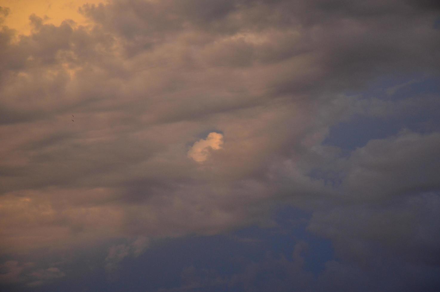 Sunset and Stormy clouds photo