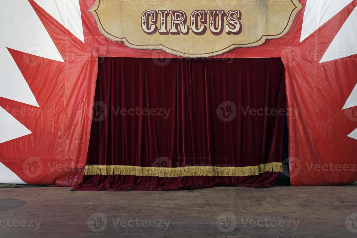 Closed stage curtains of a circus before the show photo