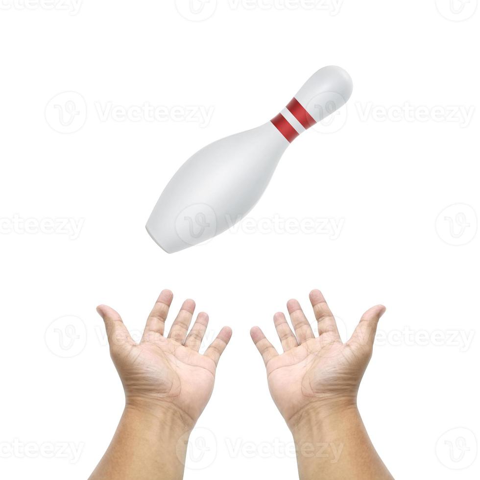 Hand holding Bowling Pin on white background photo