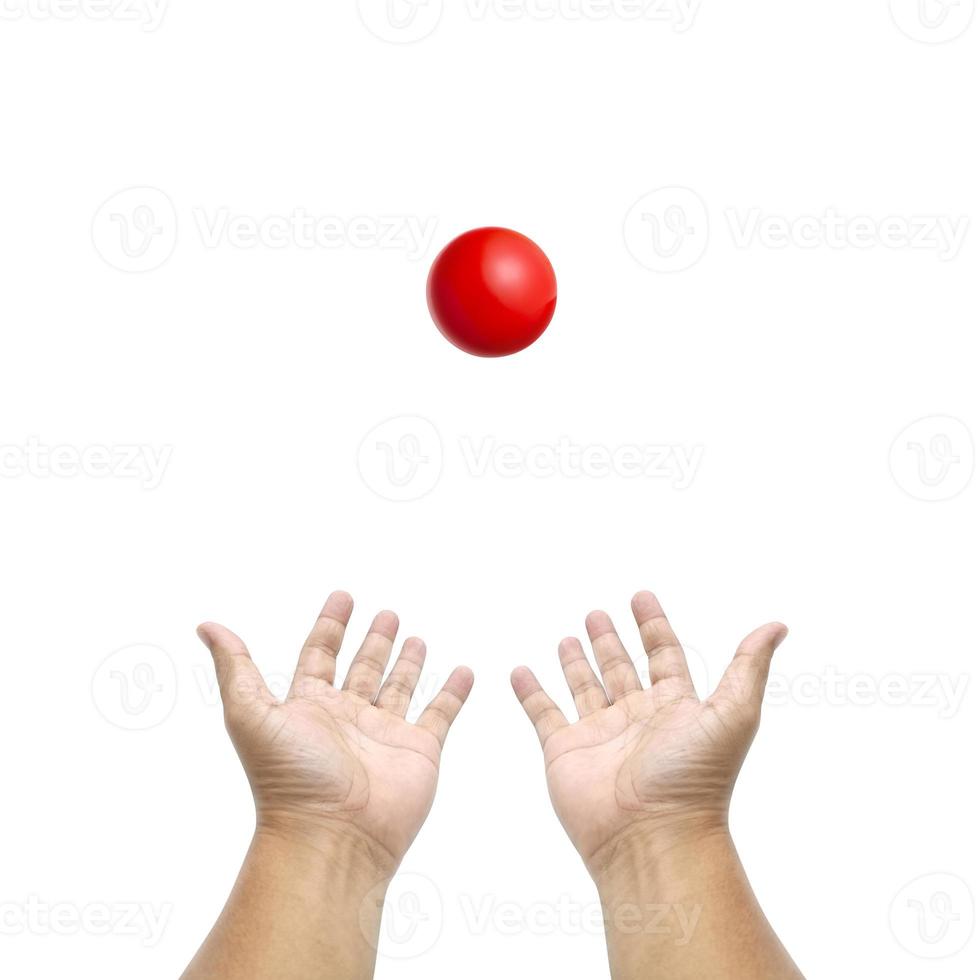 Hand holding snooker ball on white background photo
