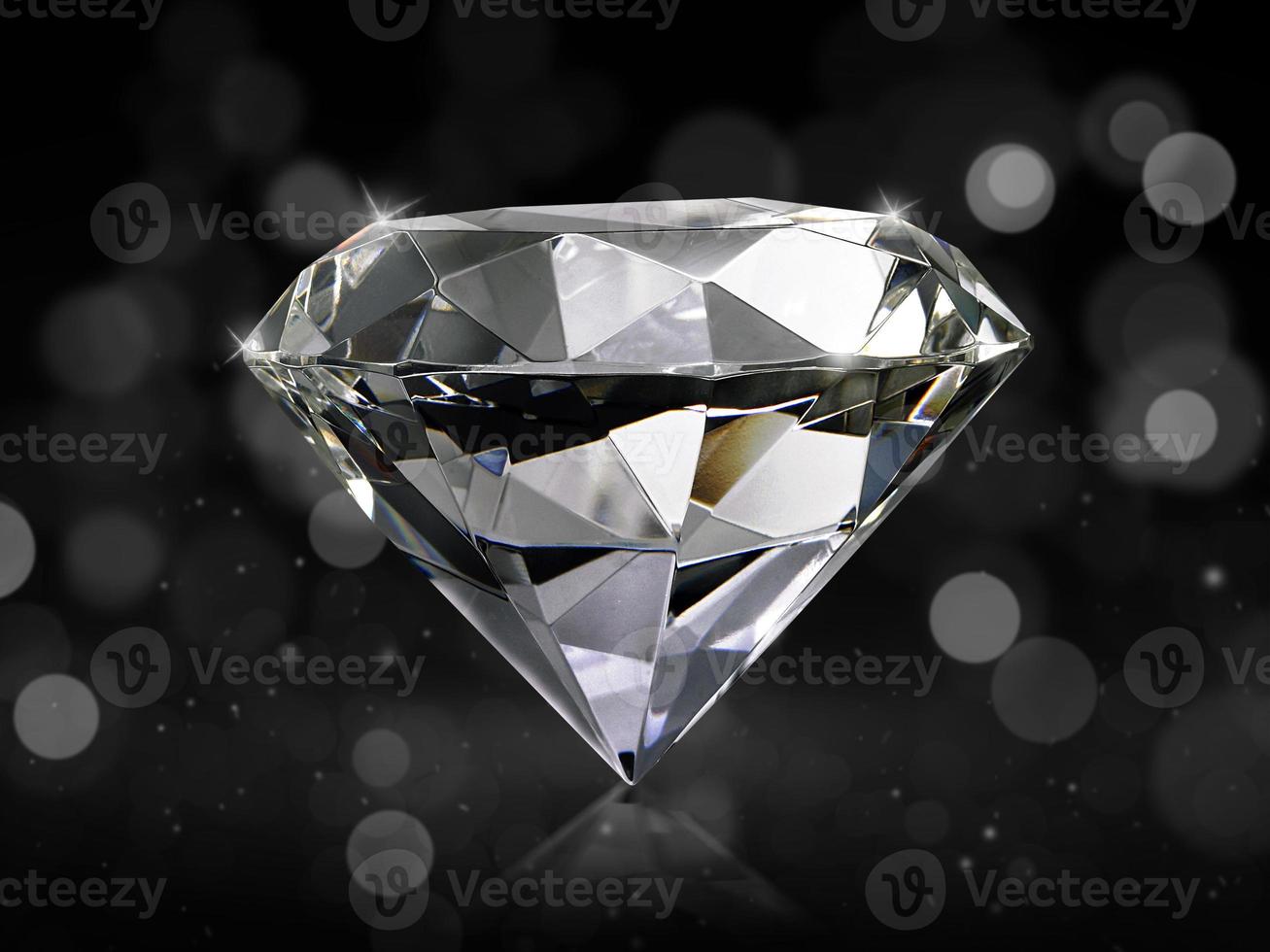 Diamante deslumbrante sobre fondo abstracto bokeh de oro foto