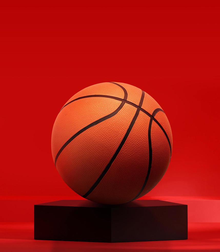 Basketball on black pentagon podium in the red studio photo