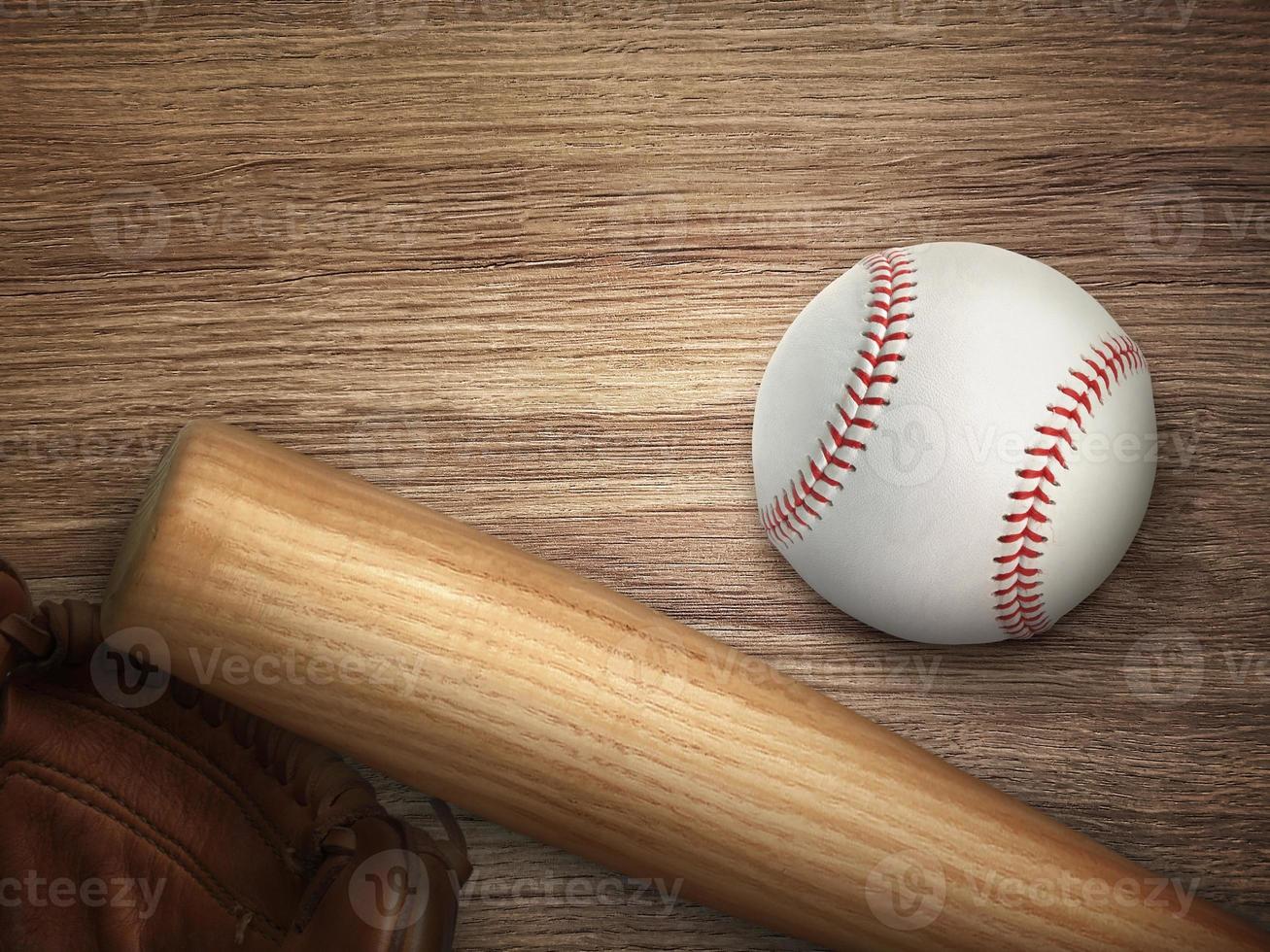 Baseball bat, glove and ball on wooden floor. Sport theme background with copy space for text and advertisment photo