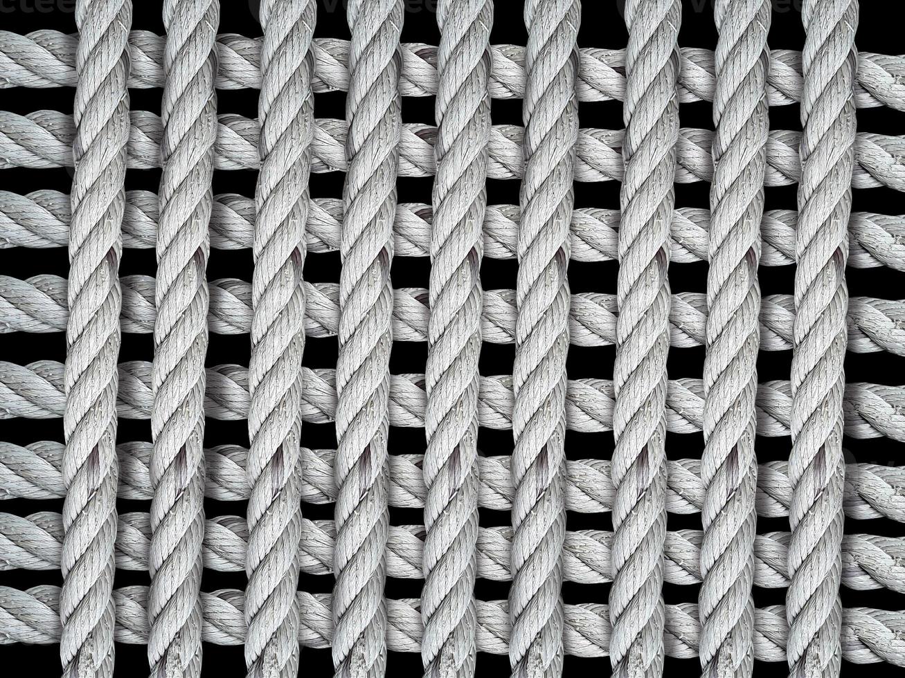 Rope in the form of a grid on black background photo