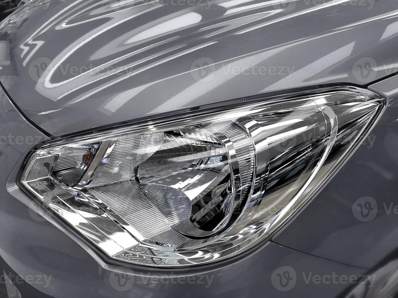 Car headlight with shallow depth of field photo