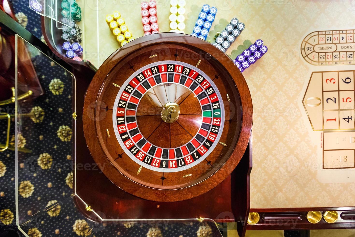 gambling chips on a game table roulette photo