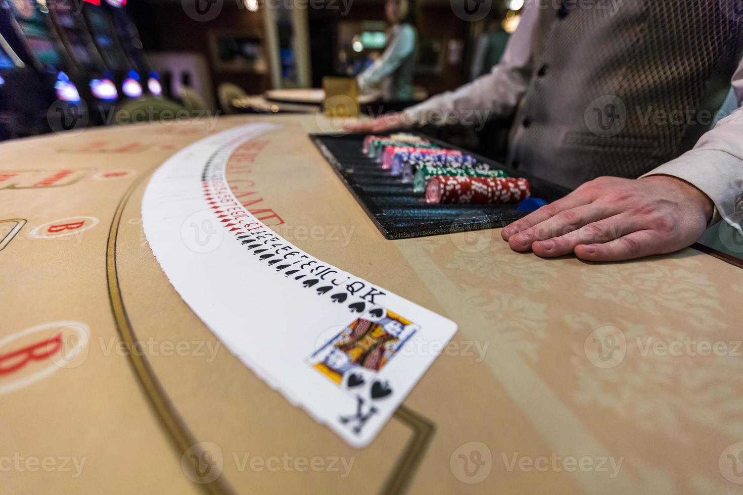 gambling chips and cards on a game table roulette photo