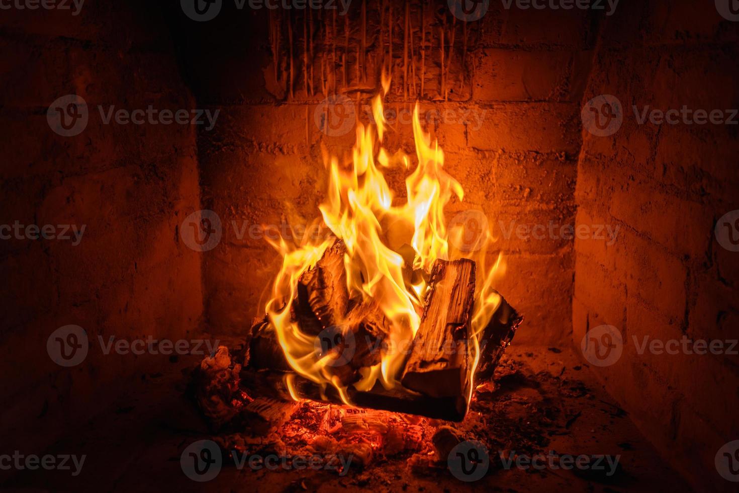 Fire flames in fireplace background photo