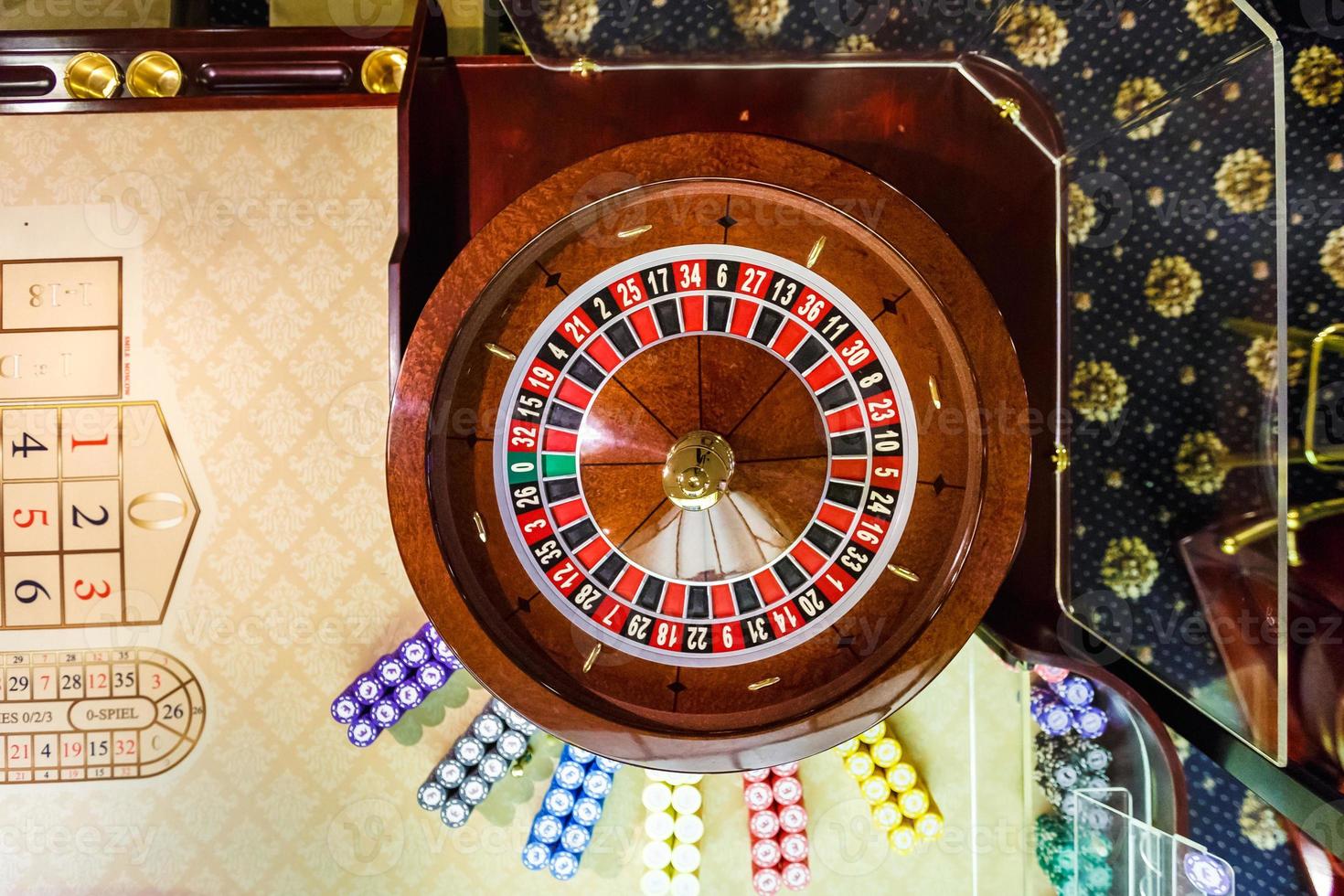 gambling chips on a game table roulette photo