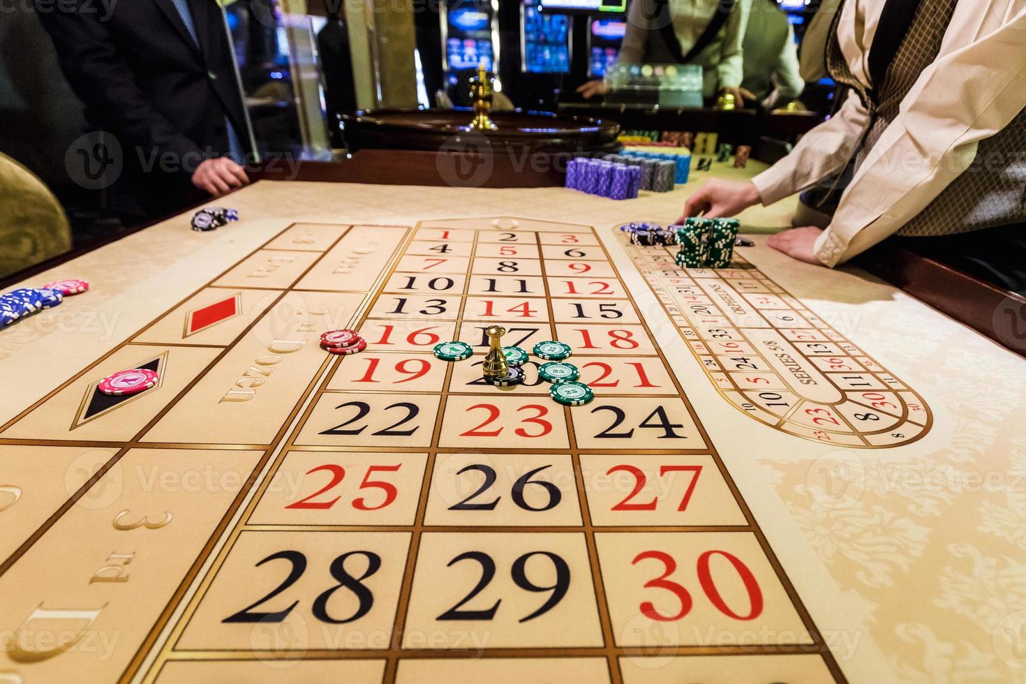 gambling chips on a game table roulette photo